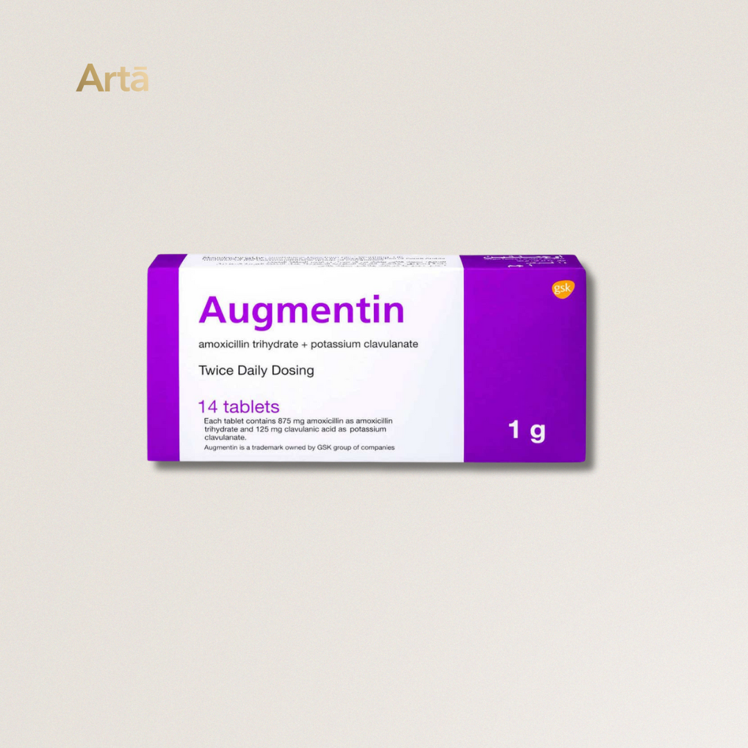 Box of Augmentin tablets with purple and white design on a beige background