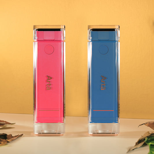 Arta Couple Package Mini Water Flosser set of 2 (pink & blue), ideal for partners’ oral care with compact travel design | باقة آرتا الزوجية لجهاز الخيط المائي المصغر مكونة من ٢ (زهري وأزرق)، مثالية للعناية الفموية للأزواج وتصميم مدمج للسفر.