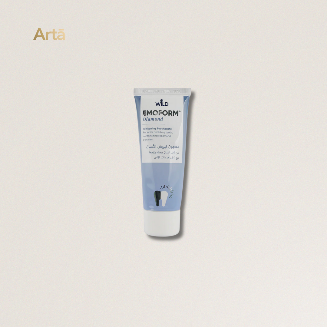 Tube of Wild Emoform Diamond toothpaste on a light gray background