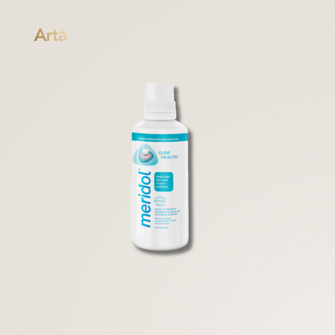 Meridol dental solution bottle on a light gray background