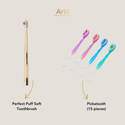 Three containers of PTFE waxed dental floss with the brand 'Artà' displayed on them, placed on a marble surface.