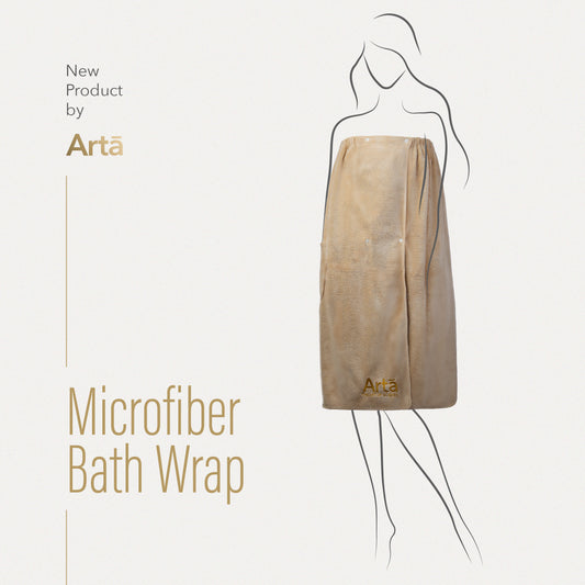 A beige microfiber bath wrap with the ArtĄ brand logo visible on the product.