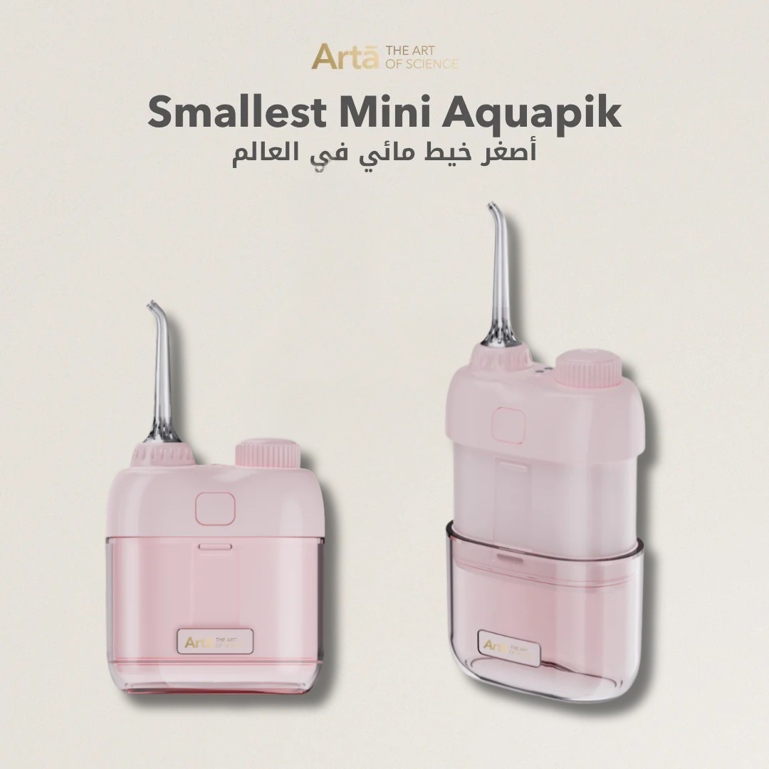 Arta Smallest Mini Aquapik water flosser in soft pink color shown in front and angled side views on a beige background, compact portable oral irrigator with transparent water tank and angled nozzle for daily and travel oral hygiene.

أصغر ميني أكوابيك من آرتا باللون الوردي معروض بزاوية أمامية وجانبية على خلفية بيج، جهاز خيط مائي محمول مع خزان شفاف ورأس مائل للعناية اليومية بالفم وأثناء السفر.


أصغر ميني أكوابيك من آرتا باللون الوردي هو جهاز خيط مائي صغير الحجم بتصميم أنيق، يوفر تنظيفًا لطيفًا وفعالًا للأسن