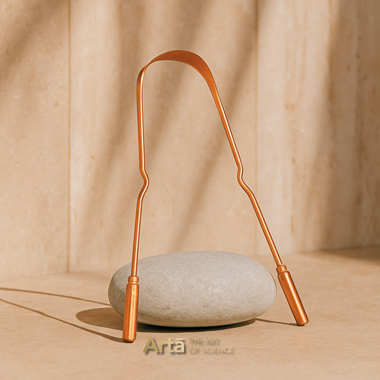 Copper balance weight on a stone with a beige background