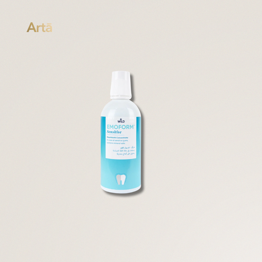Bottle of Emoform Sensitive dental product on a light beige background with 'Arta' branding.